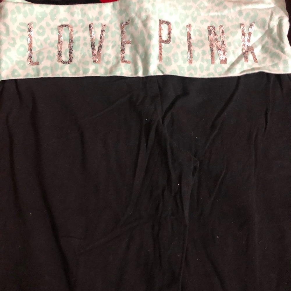 Pink bling boot cut leggings in a size large